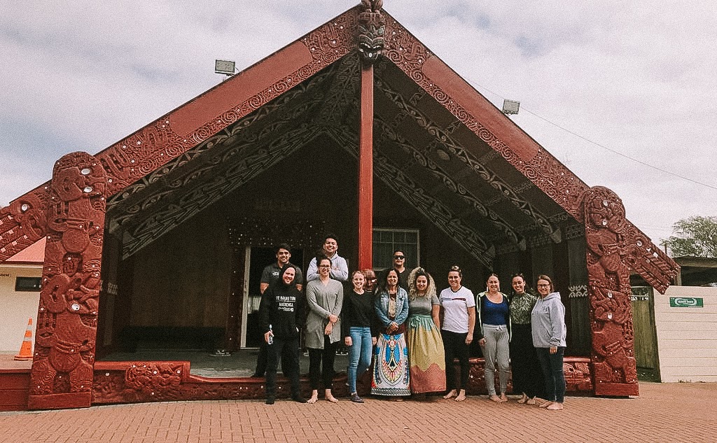 Image of a group in front of a Marae