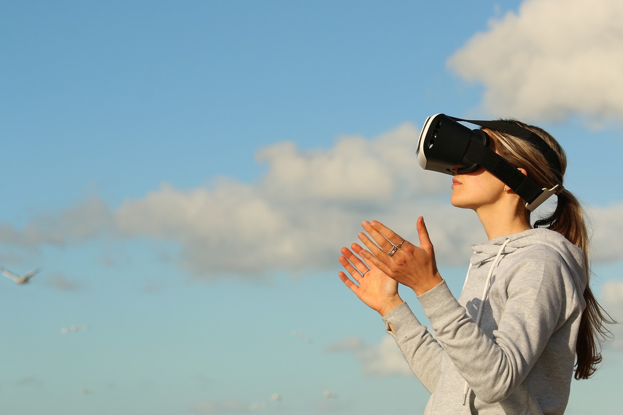 An image of a woman using virtual reality technology