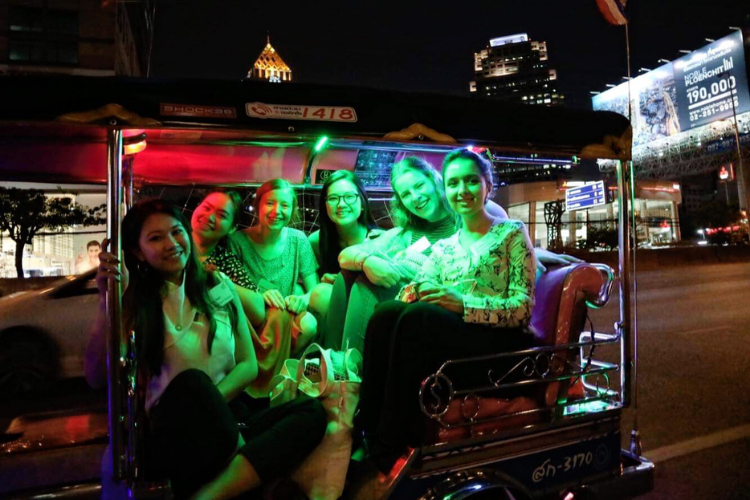 An image of women sitting in a tuktuk at the Sukhothai