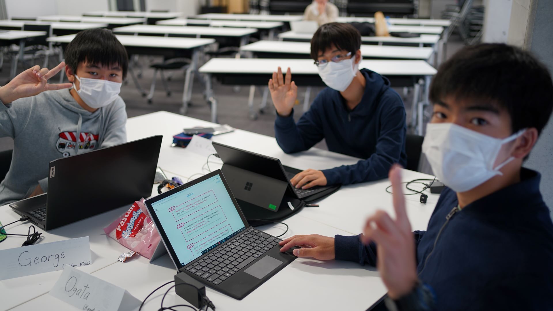 An image of Japanese high school students on computers at Code Avengers